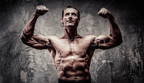 Homem corpo musculoso esportes fitness exercer Foto stock © Nejron