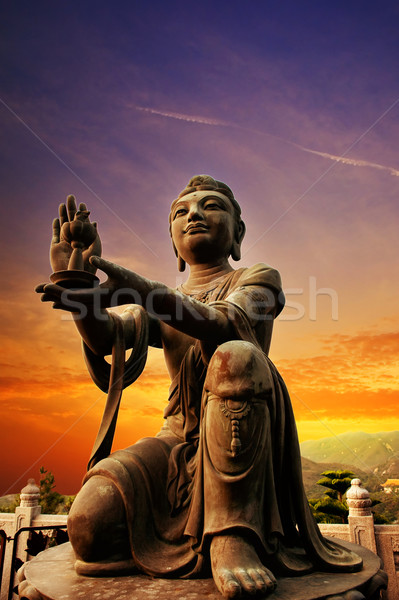 Buddhistic statue praising and making offerings to the Tian Tan  Stock photo © Nejron
