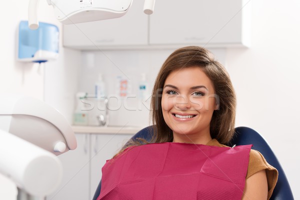 Beautiful young brunette woman visiting dentist  Stock photo © Nejron