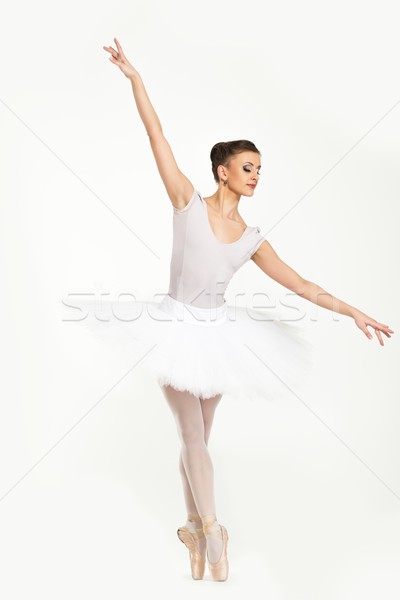 Young ballerina dancer in tutu showing her techniques  Stock photo © Nejron