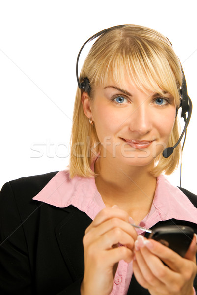 Beautiful hotline operator with cellphone in her hands isolated  Stock photo © Nejron