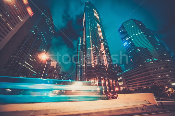 Fast moving transport at night in modern city Stock photo © Nejron