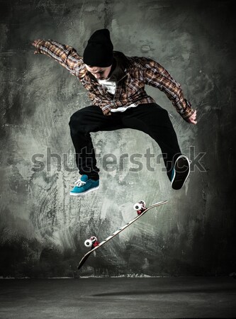 Man dancer showing break-dancing moves Stock photo © Nejron