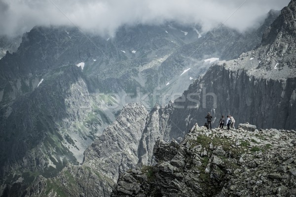 Hikers on a top of a mountain  Stock photo © Nejron