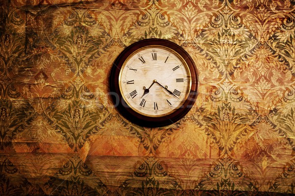 Stock photo: Vintage clock on a wall