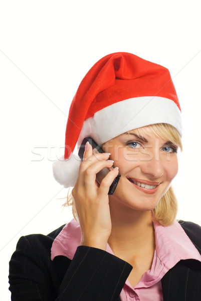 Business woman in Christmas hat talks on the phone. Isolated on  Stock photo © Nejron