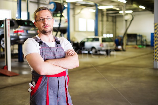 Serviceman in a car workshop Stock photo © Nejron