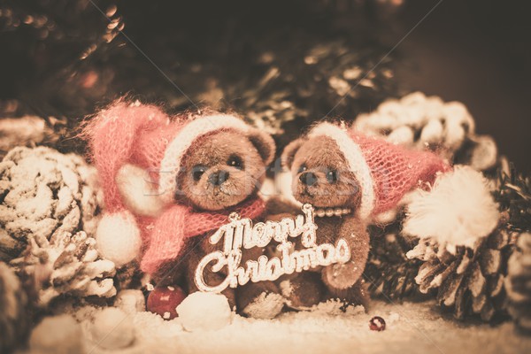 Small toy bears holding Merry Christmas sign in winter holidays still life Stock photo © Nejron