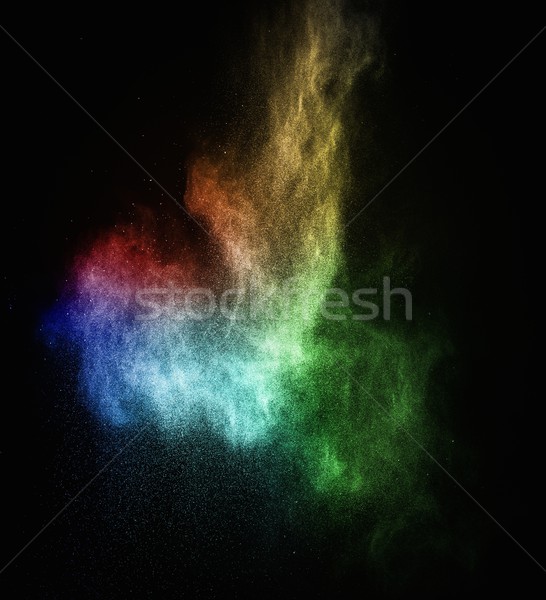 Colourful powder exploding isolated on black Stock photo © Nejron