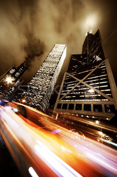 Fast moving cars at night Stock photo © Nejron