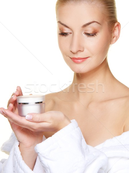 Beautiful woman with bottle of cream Stock photo © Nejron