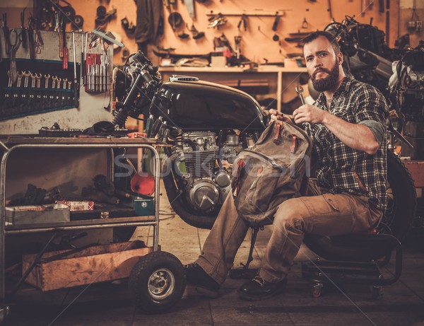 Mechanik budynku vintage stylu motocykla Zdjęcia stock © Nejron