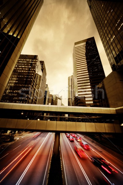 Fast moving cars at night Stock photo © Nejron