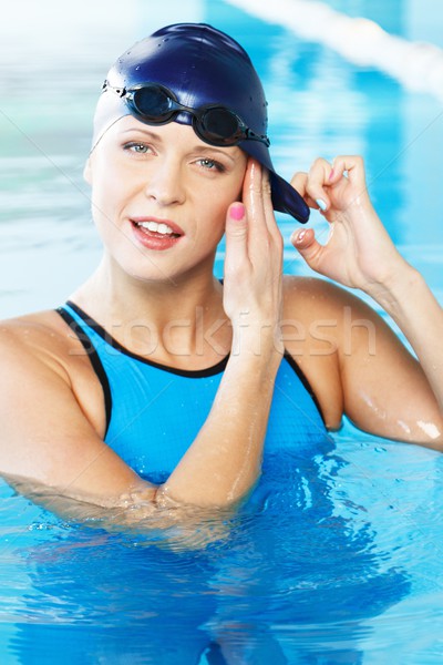 Jeune femme bleu natation costume chapeau [[stock_photo]] © Nejron