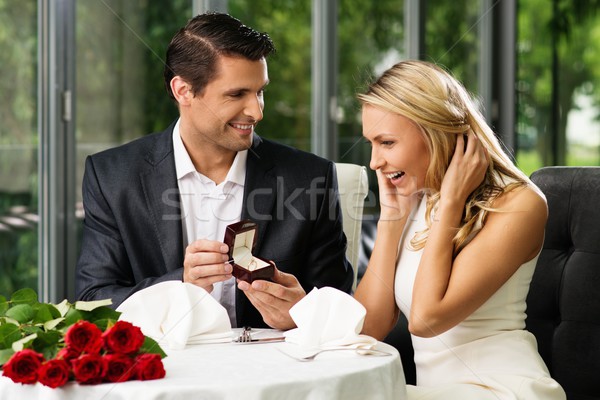 Man holding box with ring making propose to his girlfriend Stock photo © Nejron