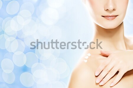 Frau Feuchtigkeitscreme Sahne Körper Gesicht Stock foto © Nejron