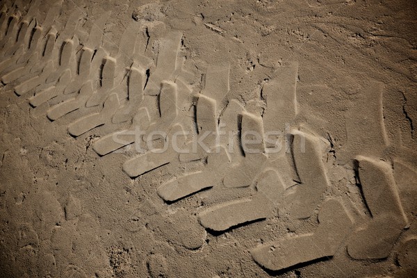 Stock photo: Tire marks on a sand