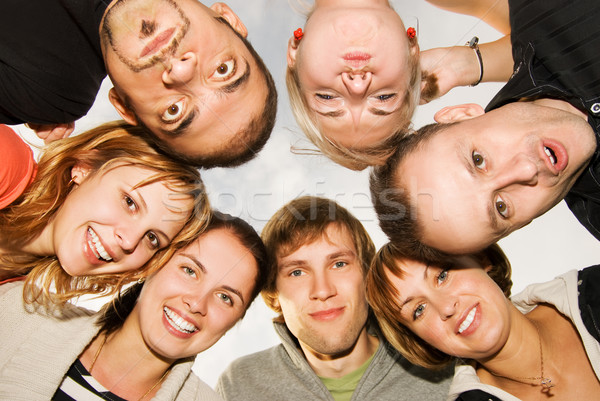 Group of happy friends making funny faces Stock photo © Nejron