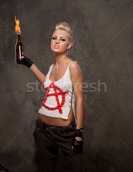 Punk girl with a Molotov cocktail Stock photo © Nejron