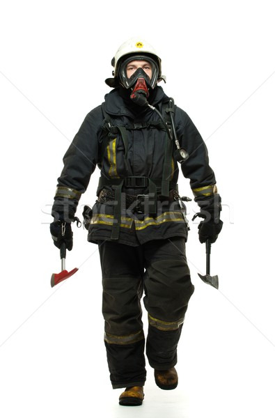 Firefighter with axe and wearing oxygen mask isolated on white  Stock photo © Nejron