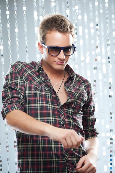 Stylish young man in a night club. Stock photo © Nejron