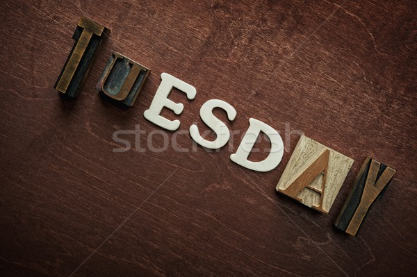 The word tuesday written on wooden background Stock photo © Nejron
