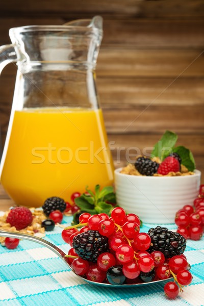 Healthy breakfast with fresh orange juice on tablecloth in wooden rural interior  Stock photo © Nejron