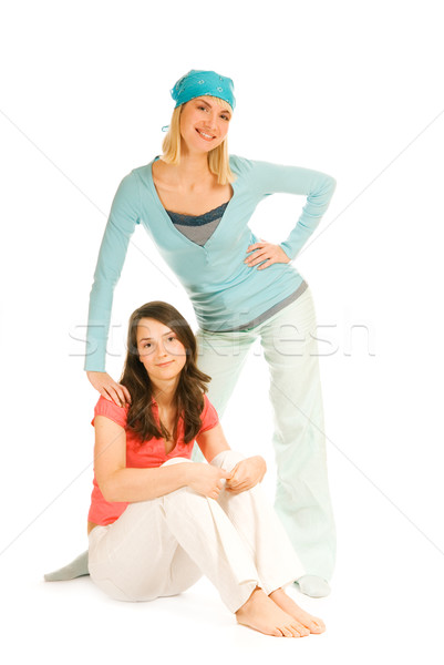 Two teenage girls isolated on white background Stock photo © Nejron
