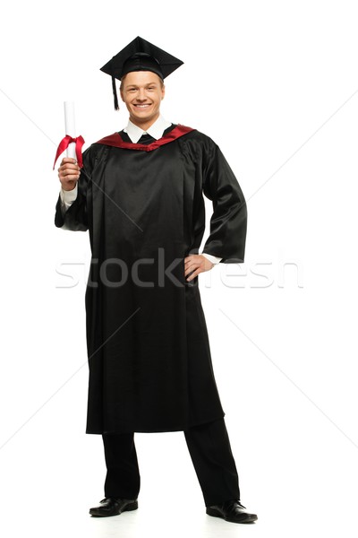 Cheerful young graduated student man isolated on white  Stock photo © Nejron