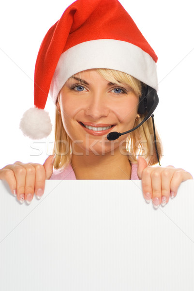 Mrs. Santa with a headset and white noticeboard isolated on whit Stock photo © Nejron