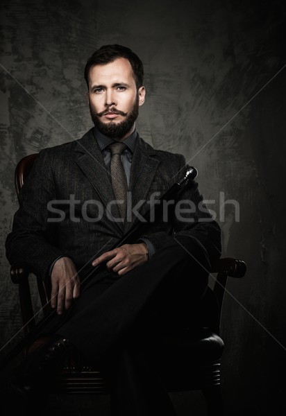 Handsome well-dressed  sitting in leather chair   Stock photo © Nejron