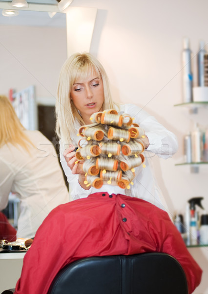 Female hairdresser working in beauty salon Stock photo © Nejron