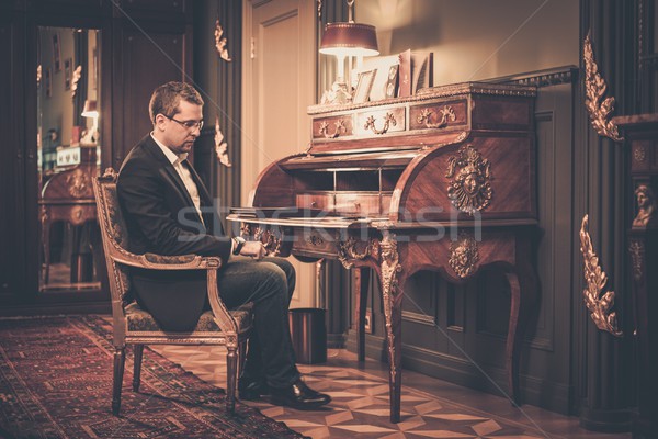 Sad middle-aged man in luxury vintage style interior  Stock photo © Nejron