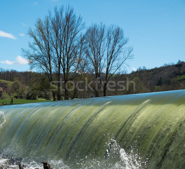 Weirs on river on a beautiful day Stock photo © Nejron