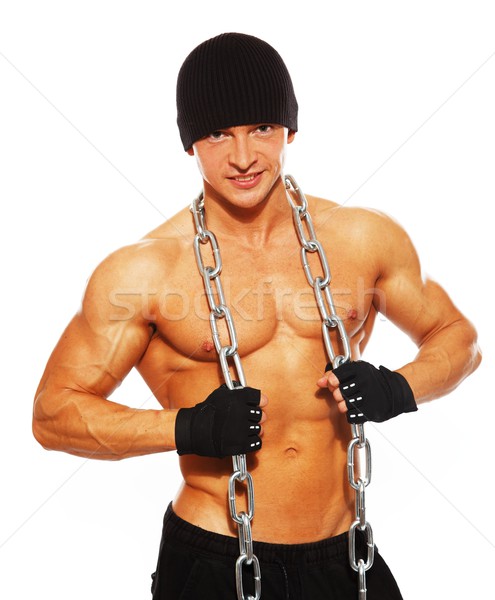 Handsome muscular man in beanie hat with chain Stock photo © Nejron