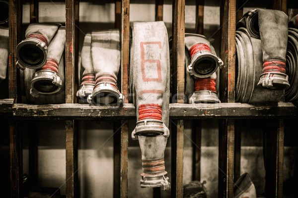 Storage room in firefighting depot with water hoses  Stock photo © Nejron