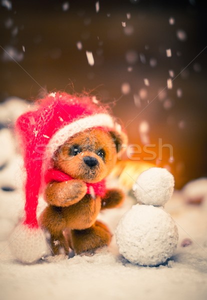 Small toy bear making snowman in christmas still life  Stock photo © Nejron