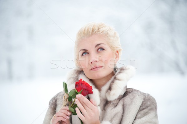 Attractive blond woman with a red rose Stock photo © Nejron