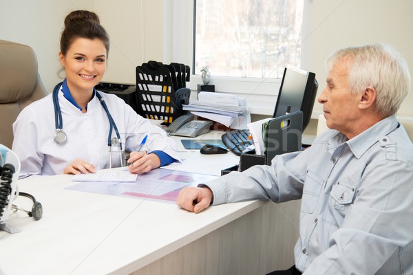 Stock photo: Senior man at doctors's office appointment 