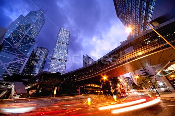 Stock photo:  Fast moving cars at night 