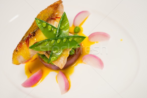 White fish fillet in sauce with radish and pies  Stock photo © Nejron