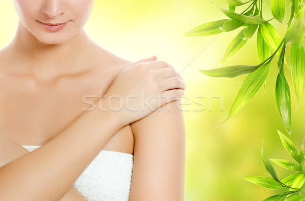 Beautiful young woman applying organic cosmetics to her skin Stock photo © Nejron