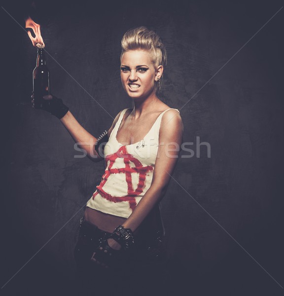Punk girl with a Molotov cocktail Stock photo © Nejron