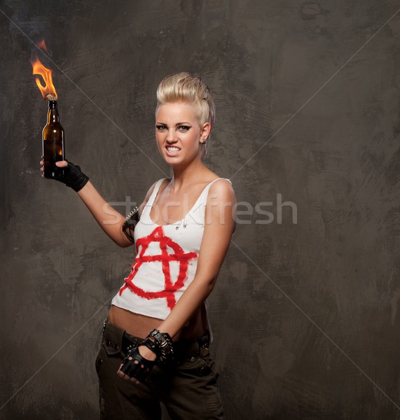 Punk girl with a Molotov cocktail. Stock photo © Nejron