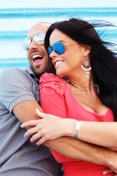 счастливым улыбаясь пару пляж Солнцезащитные очки Сток-фото © Nejron