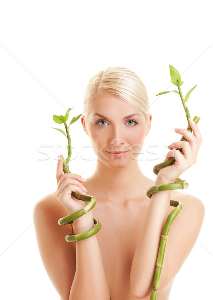 Stock photo: Beautiful woman with bamboo plant

