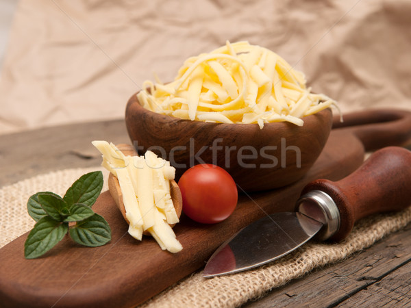 Grated yellow cheese Stock photo © Neliana