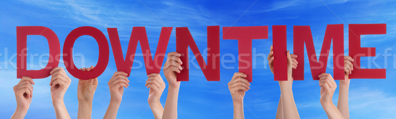 Hands Holding Red Straight Word Downtime Blue Sky Stock photo © Nelosa