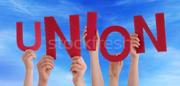 Many People Hands Holding Red Word Union Blue Sky Stock photo © Nelosa