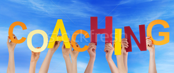 Many People Hands Holding Colorful Word Coaching Blue Sky Stock photo © Nelosa